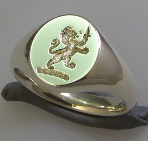 Rampant lion with dagger crest engraved signet ring